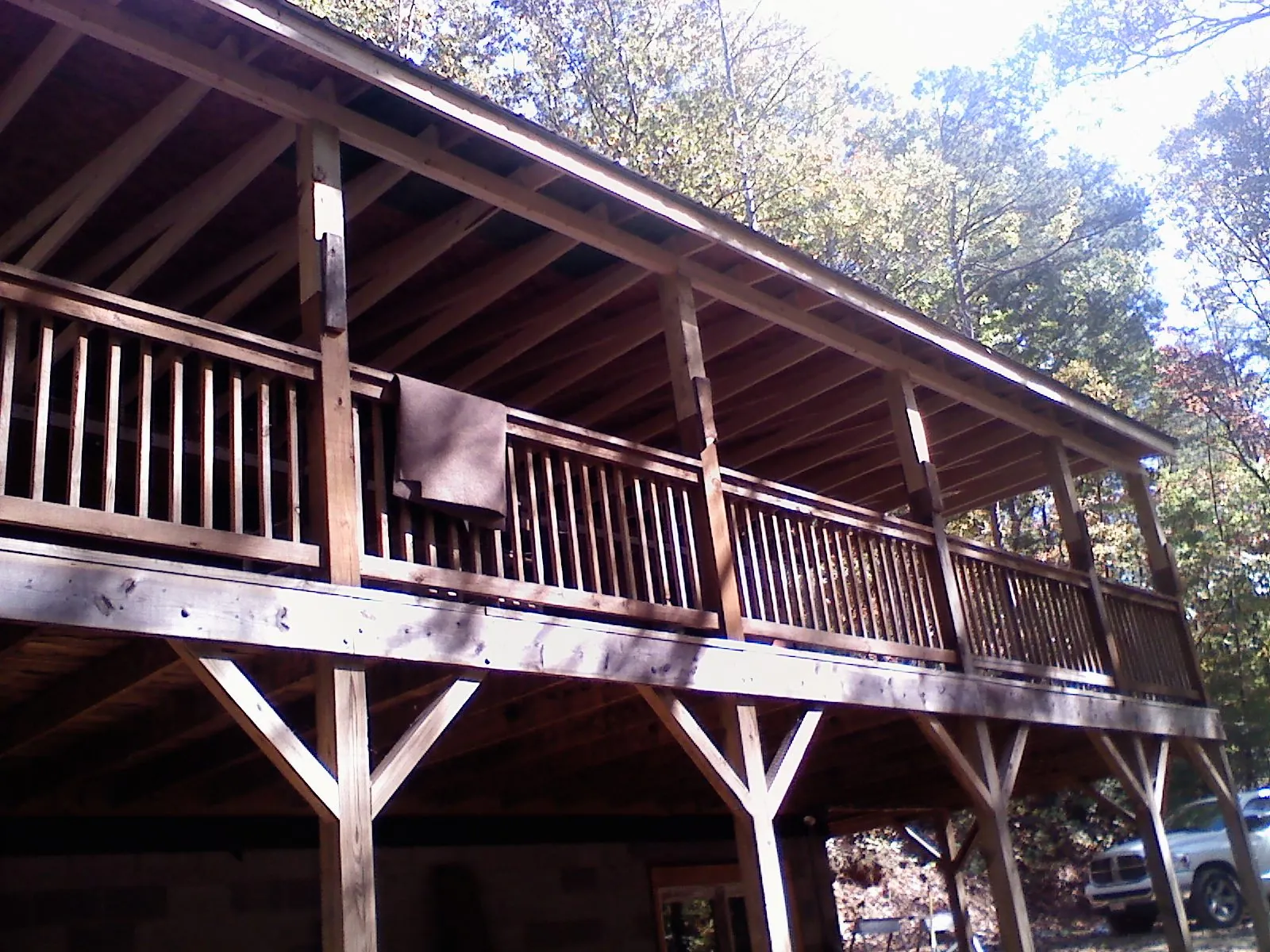 Timber framing under a new elevated porch and deck — Roof Leak Repair in Homewood by Roofing Brothers